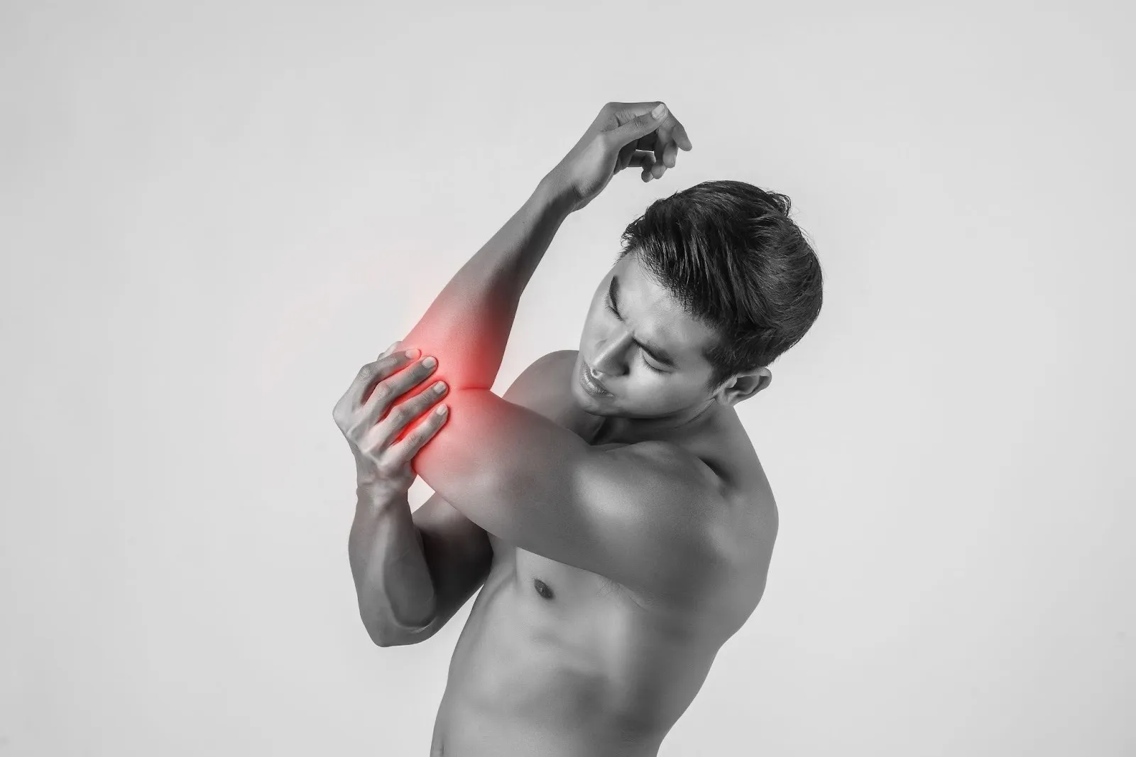 Can’t Shake That Arm Pain? A Chiropractor Might Be the Answer