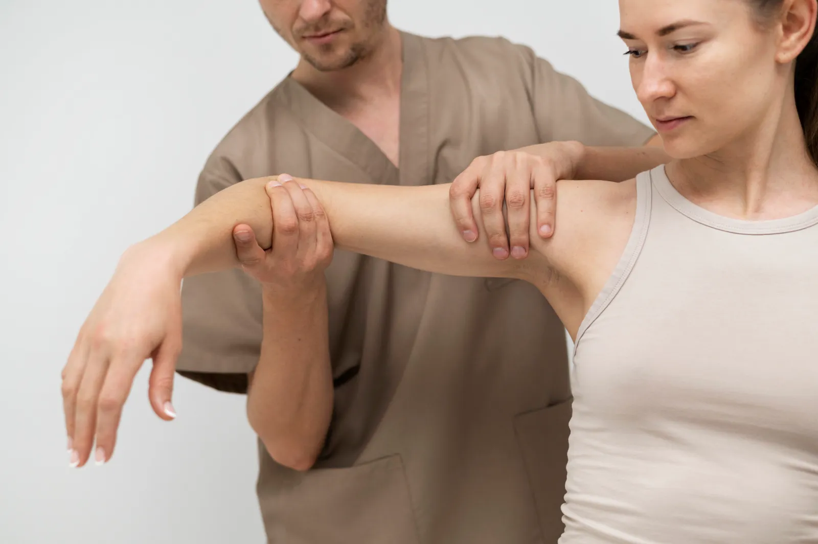 Can’t Shake That Arm Pain? A Chiropractor Might Be the Answer
